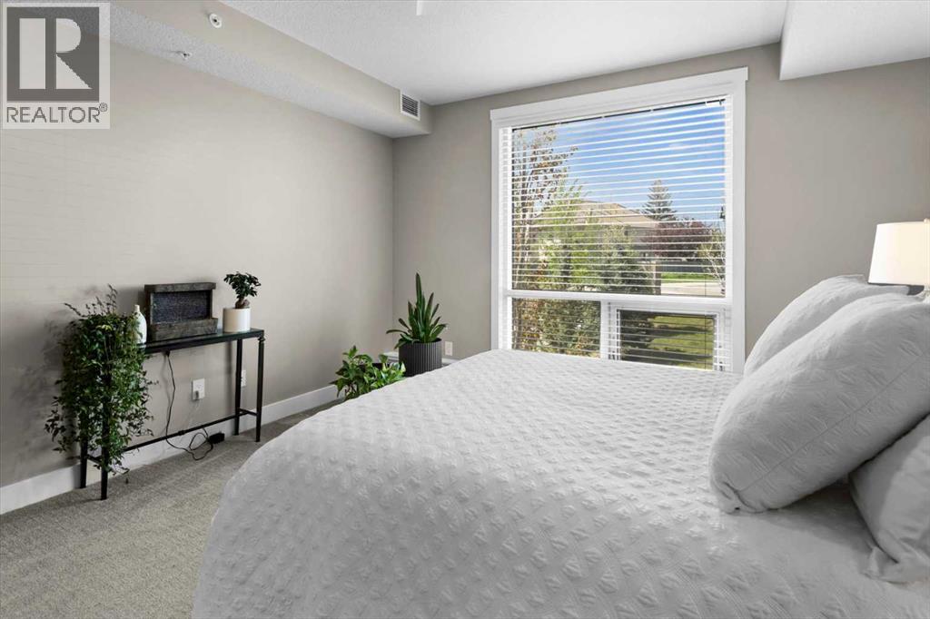 313, 15 Cougar Ridge Landing Sw, Calgary, Alberta  T3H 6C3 - Photo 21 - A2223439