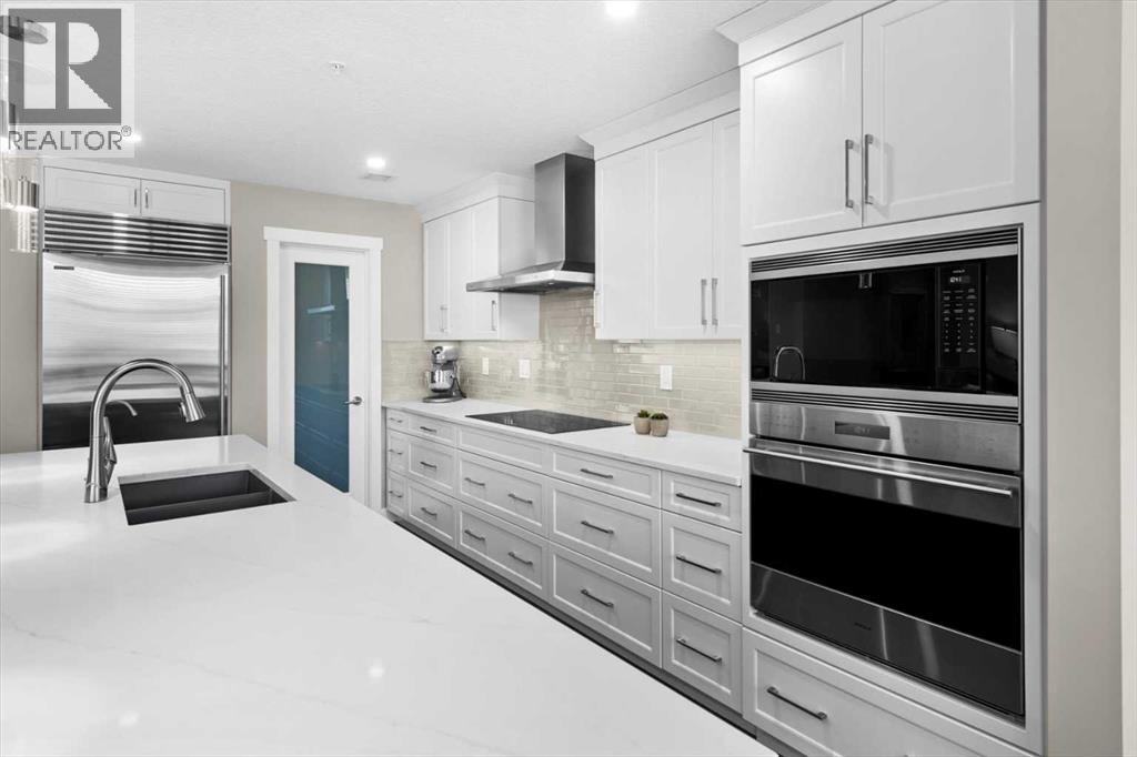 313, 15 Cougar Ridge Landing Sw, Calgary, Alberta  T3H 6C3 - Photo 16 - A2223439