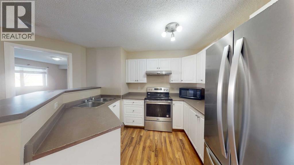 1214, 4975 130 Avenue Se, Calgary, Alberta  T2Z 4M4 - Photo 2 - A2267945