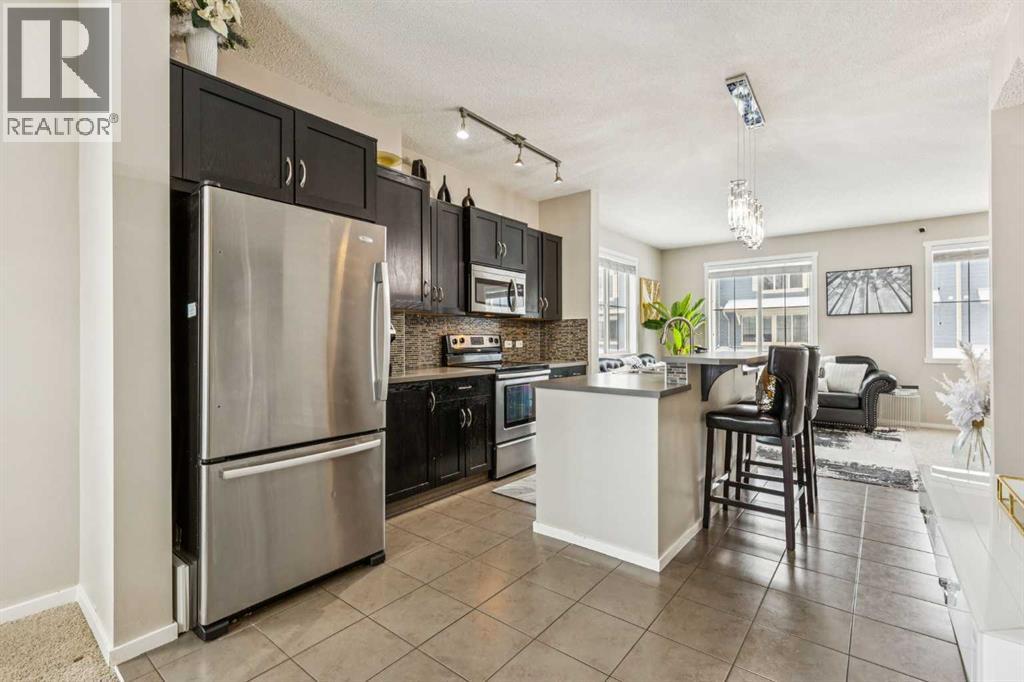 1202, 125 Panatella Way Nw, Calgary, Alberta  T3K 0R9 - Photo 6 - A2272551