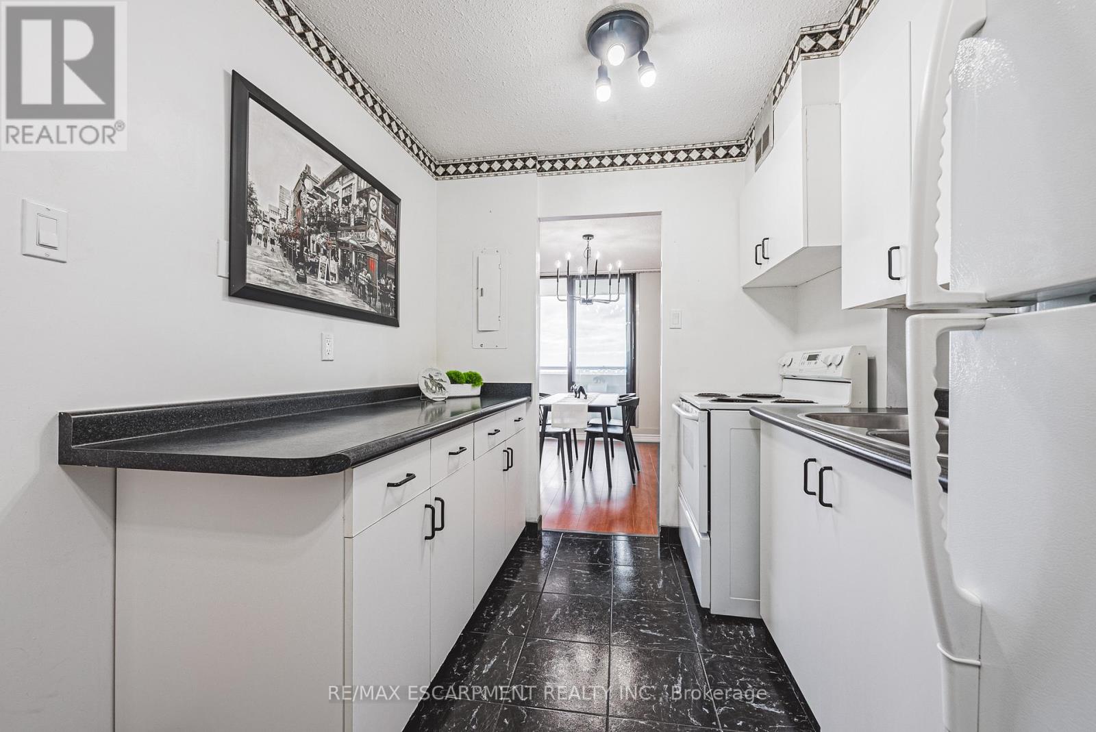 1206 - 2055 Upper Middle Road, Burlington, Ontario  L7P 3P4 - Photo 3 - W12492658