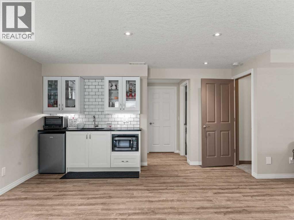 95 Crystal Shores Road, Okotoks, Alberta  T1S 2H9 - Photo 23 - A2272491