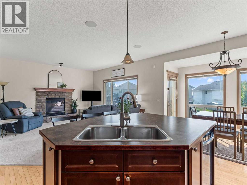 95 Crystal Shores Road, Okotoks, Alberta  T1S 2H9 - Photo 12 - A2272491