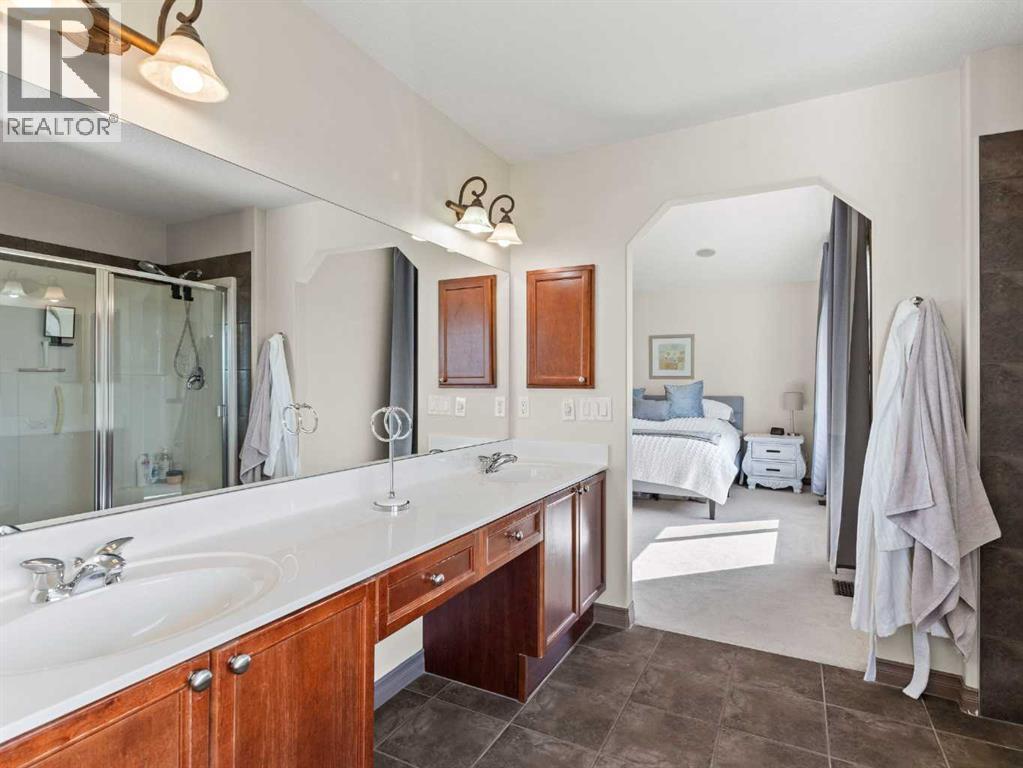 95 Crystal Shores Road, Okotoks, Alberta  T1S 2H9 - Photo 21 - A2272491