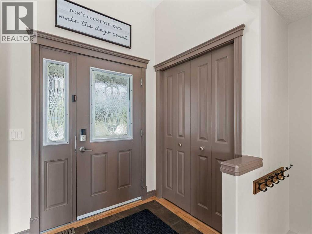 95 Crystal Shores Road, Okotoks, Alberta  T1S 2H9 - Photo 3 - A2272491