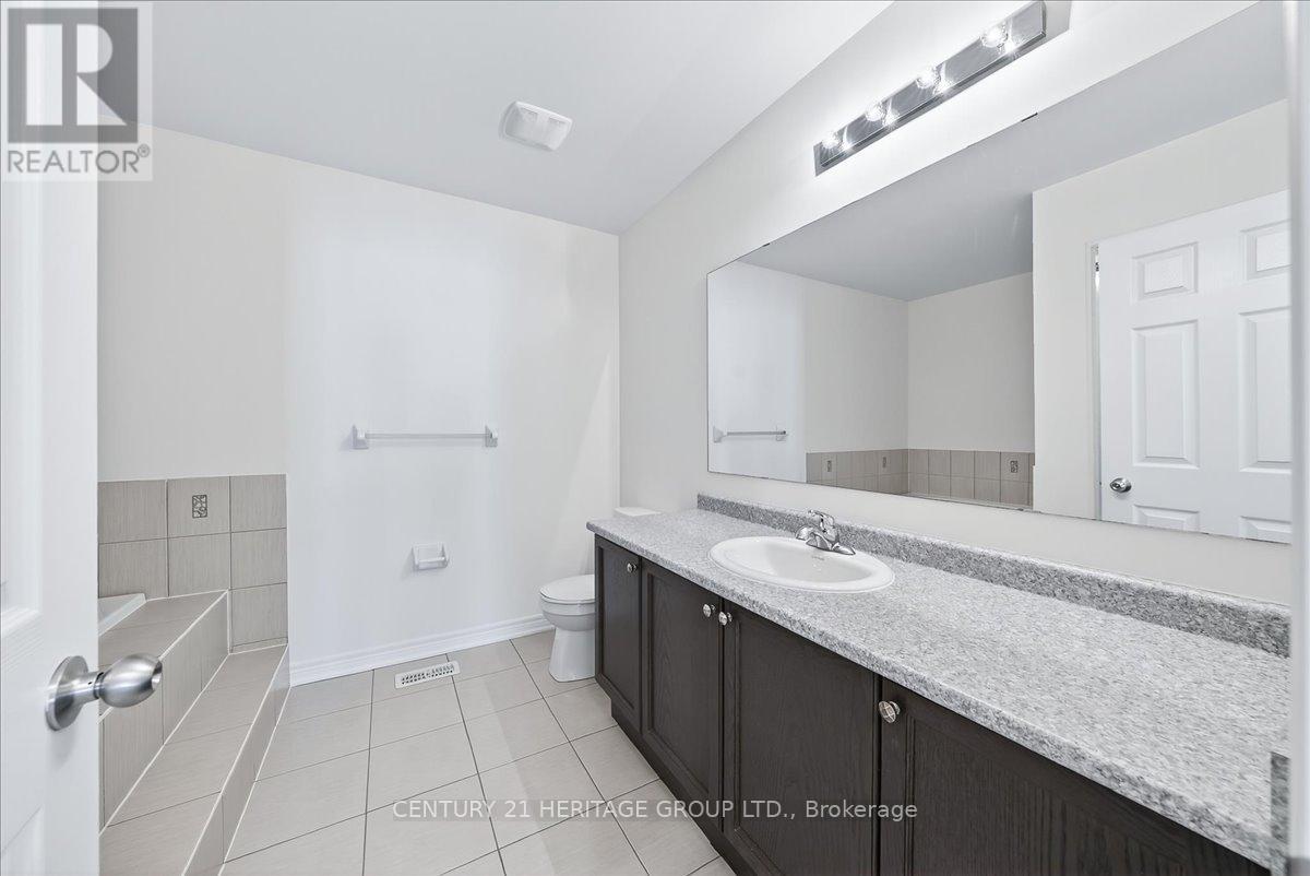 13 Mclaughlin Avenue, Milton, Ontario  L9T 8K2 - Photo 25 - W12581650