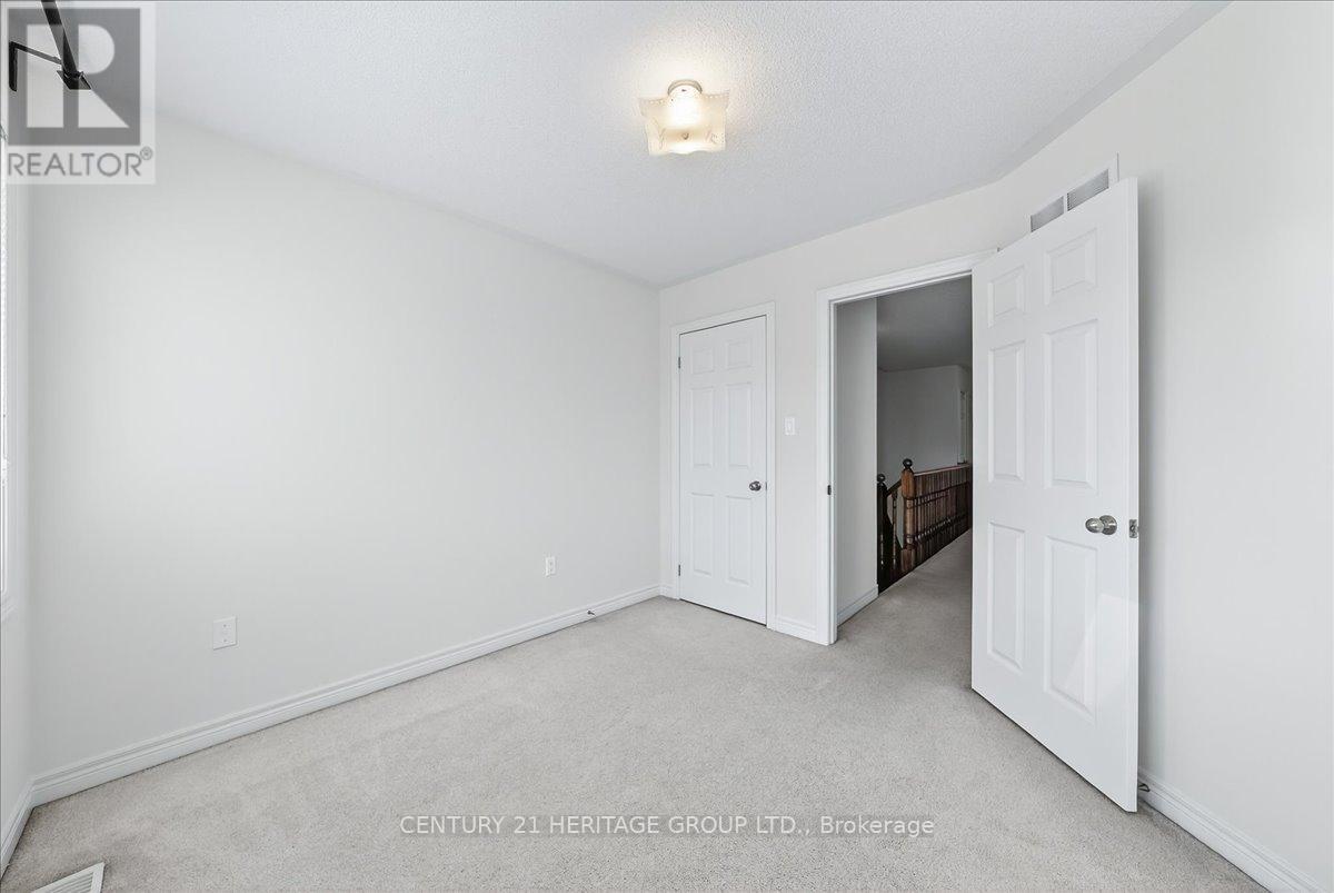 13 Mclaughlin Avenue, Milton, Ontario  L9T 8K2 - Photo 31 - W12581650