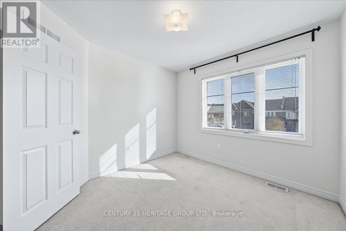 13 Mclaughlin Avenue, Milton, Ontario  L9T 8K2 - Photo 32 - W12581650