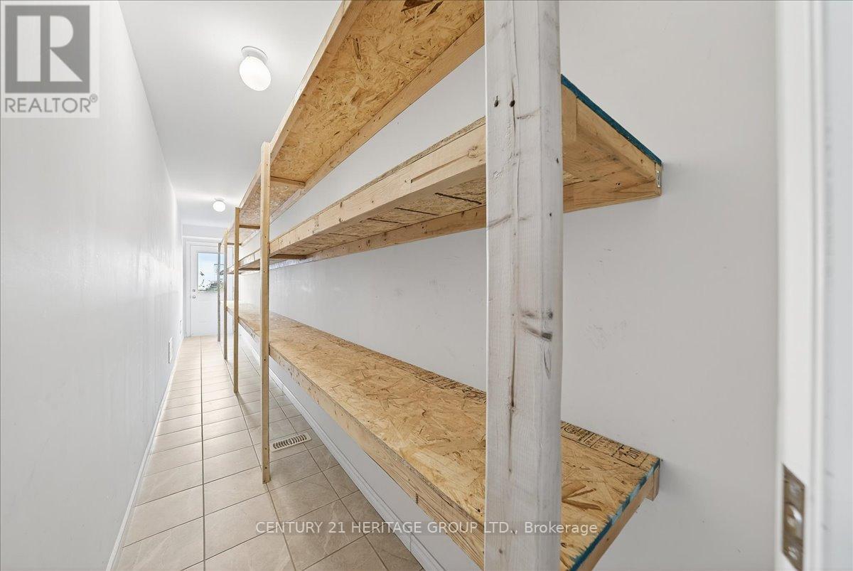 13 Mclaughlin Avenue, Milton, Ontario  L9T 8K2 - Photo 43 - W12581650