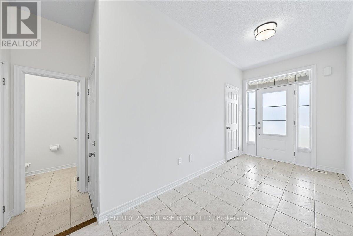 13 Mclaughlin Avenue, Milton, Ontario  L9T 8K2 - Photo 8 - W12581650