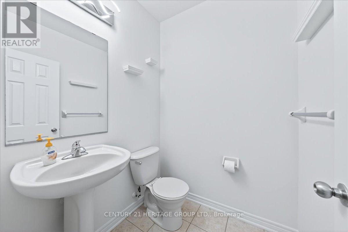 13 Mclaughlin Avenue, Milton, Ontario  L9T 8K2 - Photo 9 - W12581650