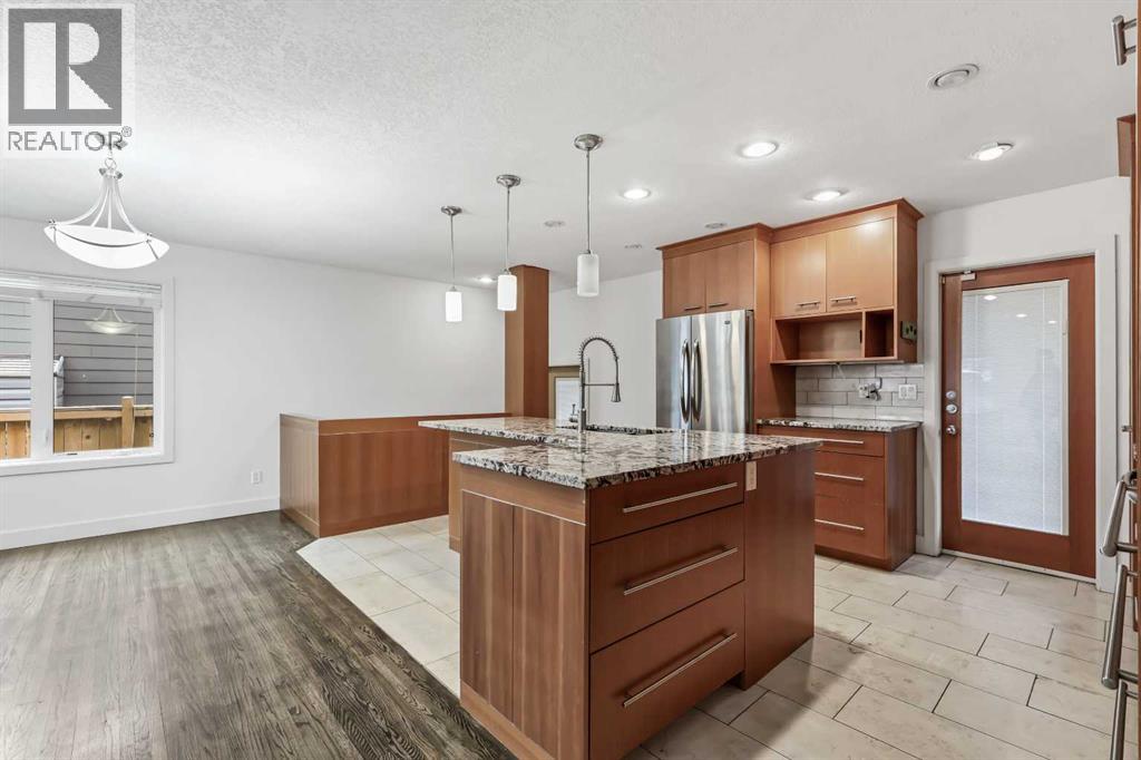 303 40 Street Sw, Calgary, Alberta  T3C 1V9 - Photo 6 - A2268837