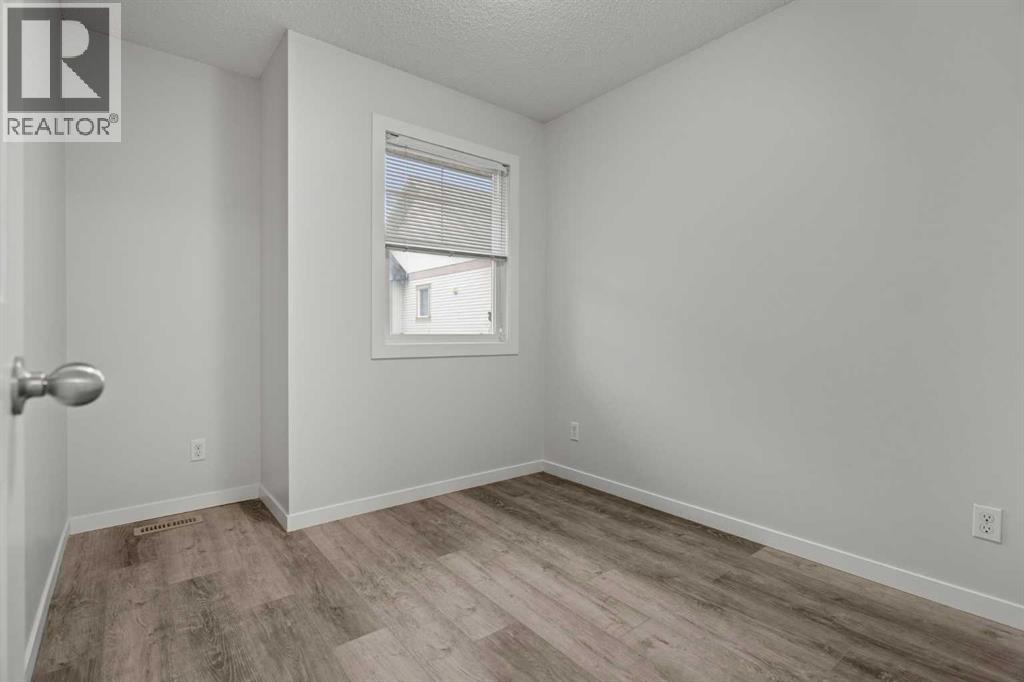 39 New Brighton Point Se, Calgary, Alberta  T2Z 1B8 - Photo 15 - A2271073