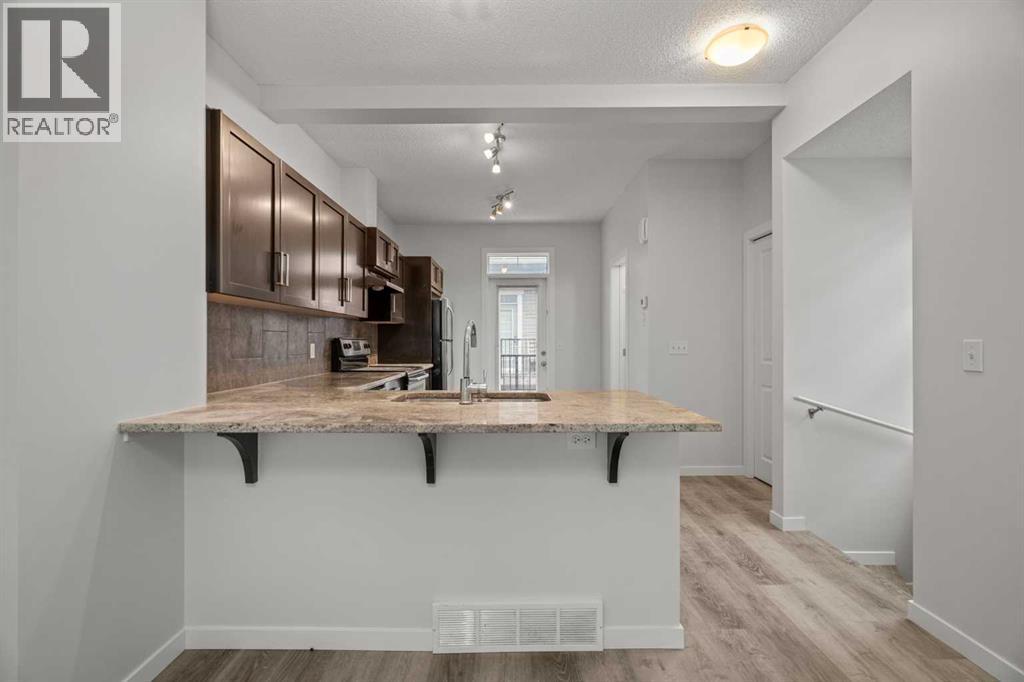 39 New Brighton Point Se, Calgary, Alberta  T2Z 1B8 - Photo 2 - A2271073