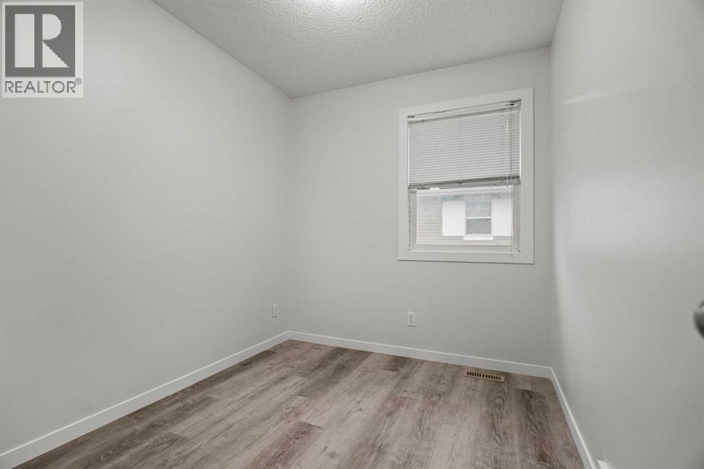 39 New Brighton Point Se, Calgary, Alberta  T2Z 1B8 - Photo 17 - A2271073