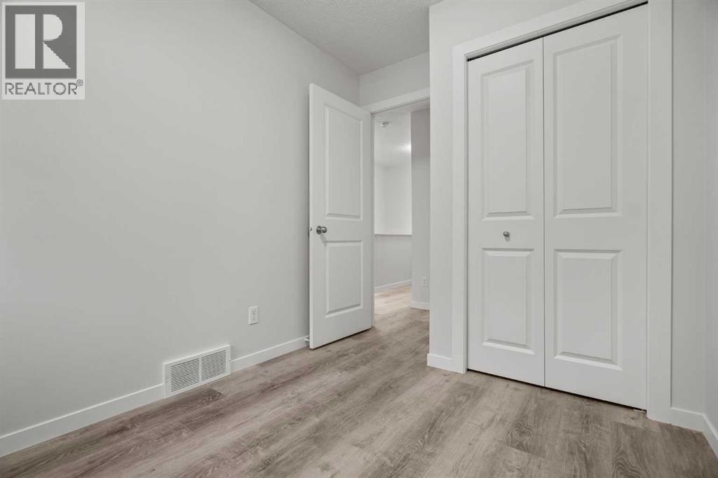 39 New Brighton Point Se, Calgary, Alberta  T2Z 1B8 - Photo 18 - A2271073