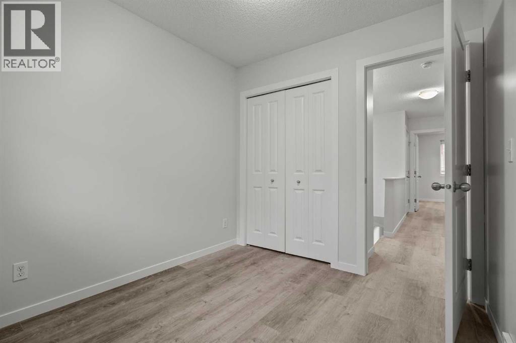 39 New Brighton Point Se, Calgary, Alberta  T2Z 1B8 - Photo 16 - A2271073