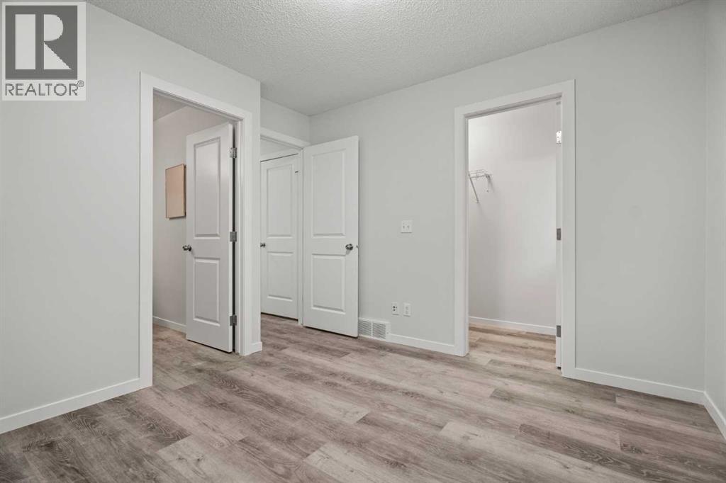 39 New Brighton Point Se, Calgary, Alberta  T2Z 1B8 - Photo 22 - A2271073