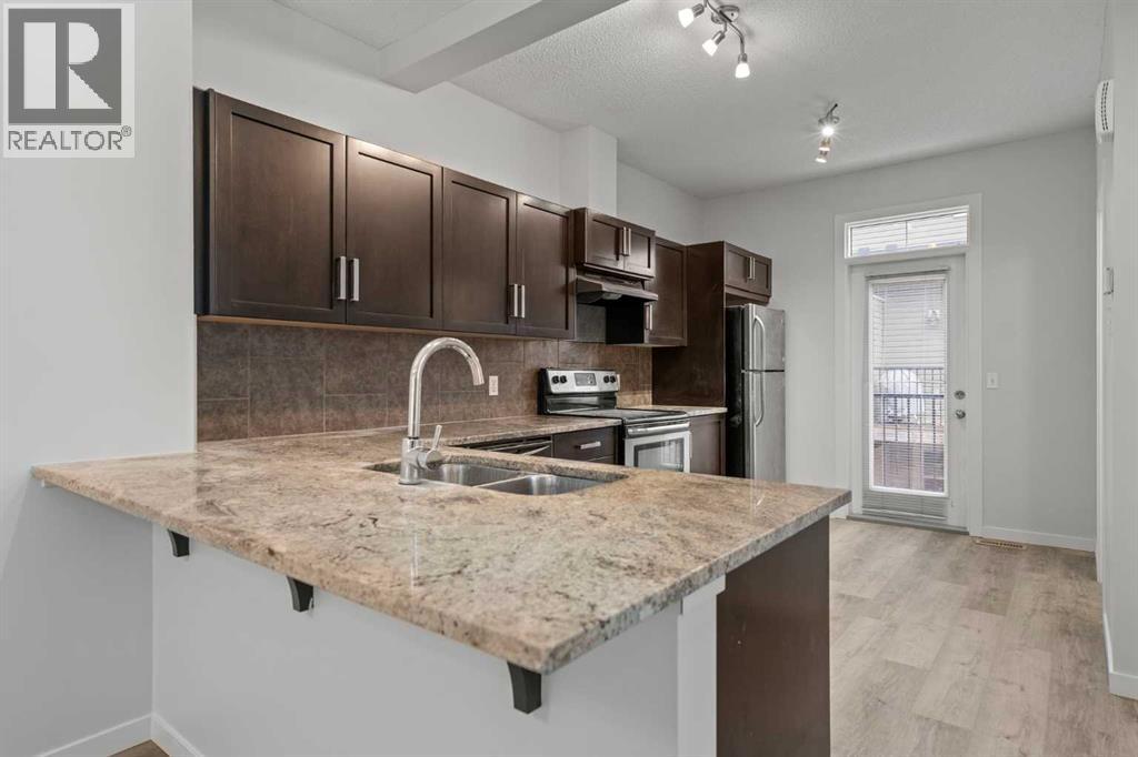 39 New Brighton Point Se, Calgary, Alberta  T2Z 1B8 - Photo 3 - A2271073