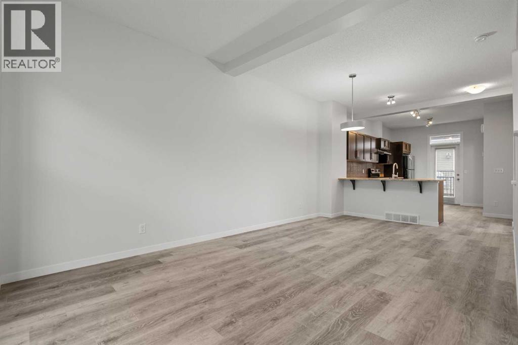 39 New Brighton Point Se, Calgary, Alberta  T2Z 1B8 - Photo 9 - A2271073