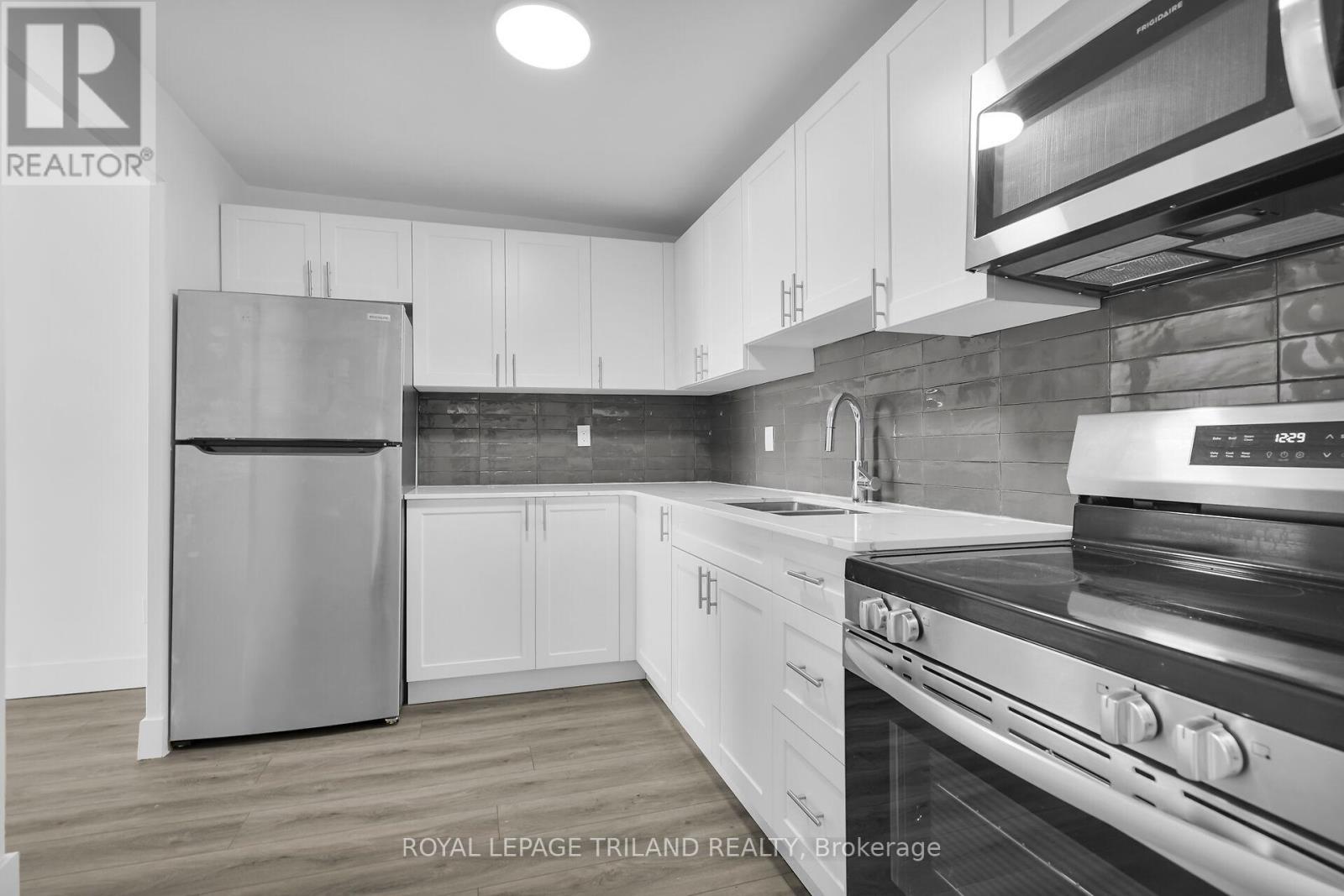 309 - 294 Saulsbury Street, Strathroy-Caradoc, Ontario N7G 2B2 - Photo 5 - X12582098