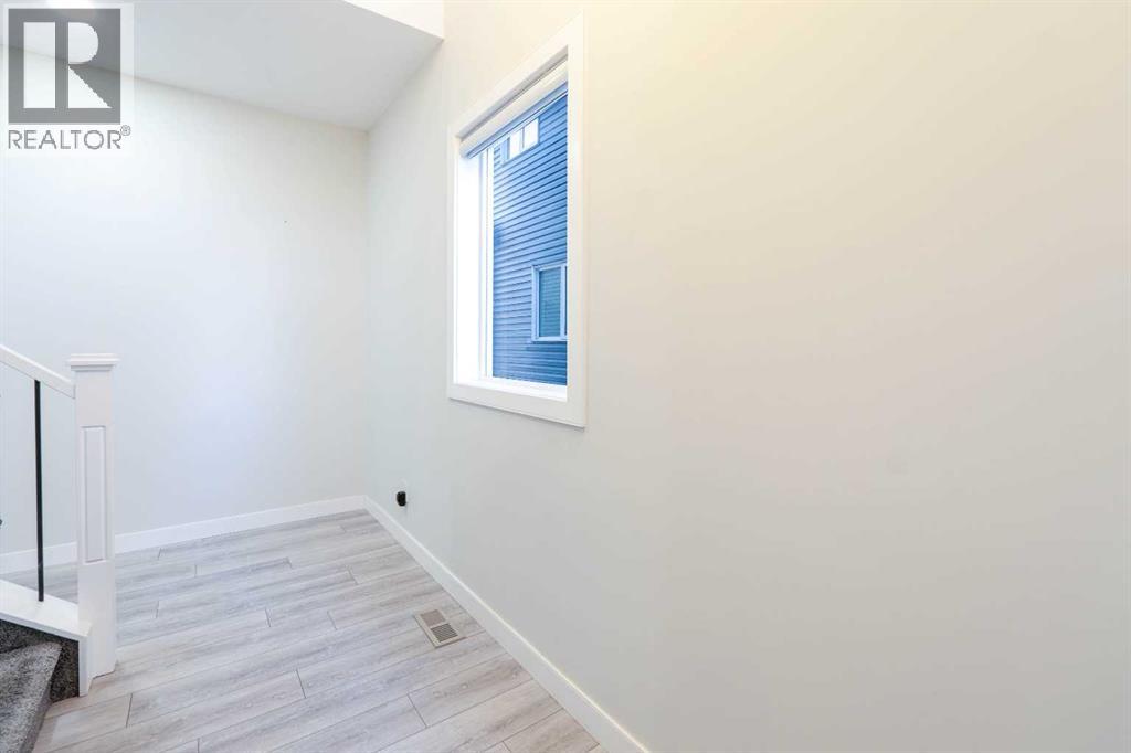 15 Midgrove Drive Sw, Airdrie, Alberta  T4B 5H1 - Photo 7 - A2269302