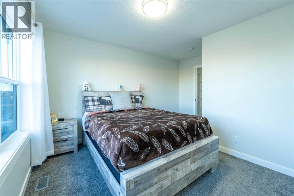15 Midgrove Drive Sw, Airdrie, Alberta  T4B 5H1 - Photo 32 - A2269302