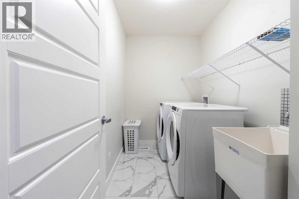 15 Midgrove Drive Sw, Airdrie, Alberta  T4B 5H1 - Photo 34 - A2269302