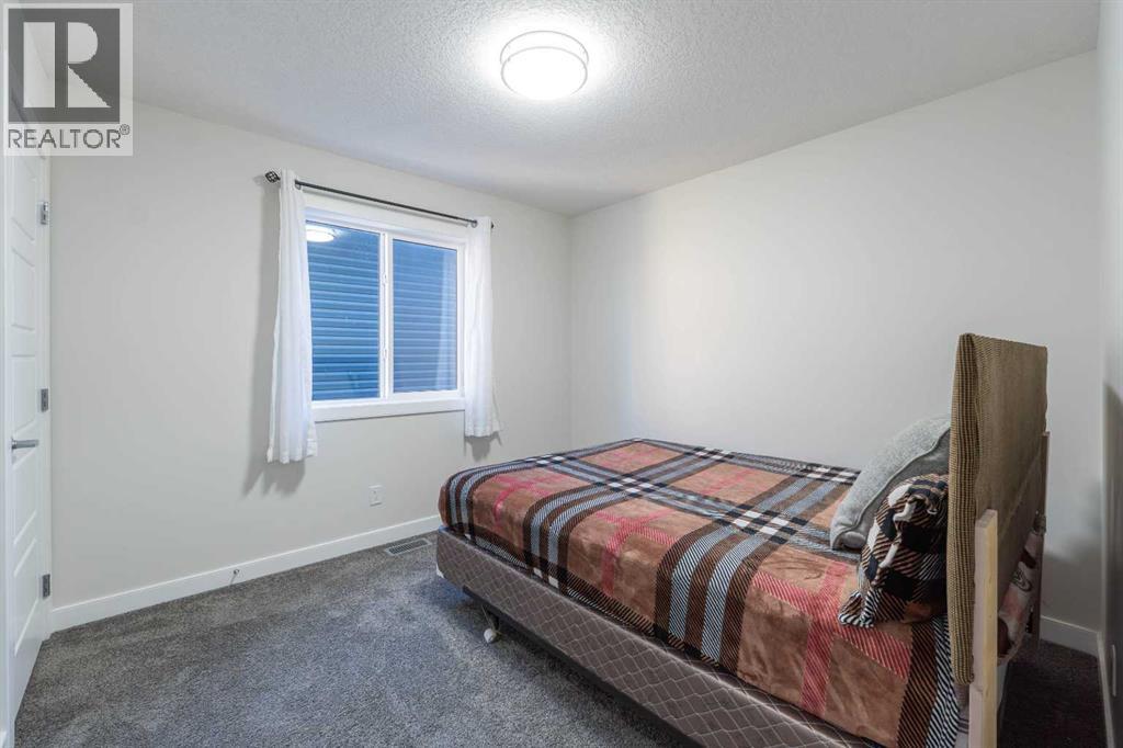 15 Midgrove Drive Sw, Airdrie, Alberta  T4B 5H1 - Photo 28 - A2269302
