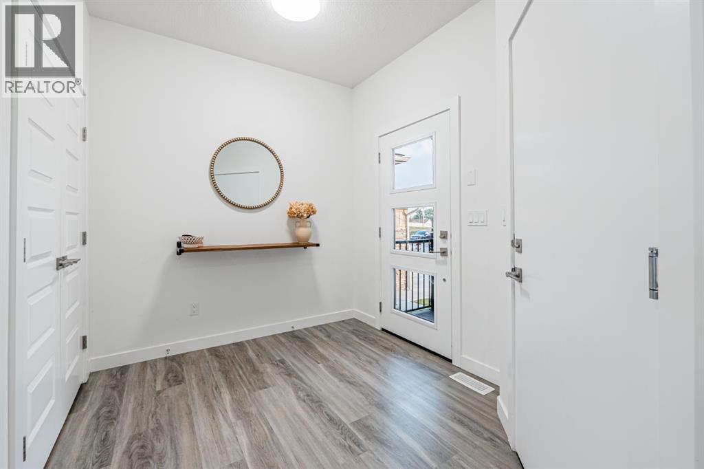 112 Midtown Close Sw, Airdrie, Alberta  T4B 5G9 - Photo 3 - A2268751