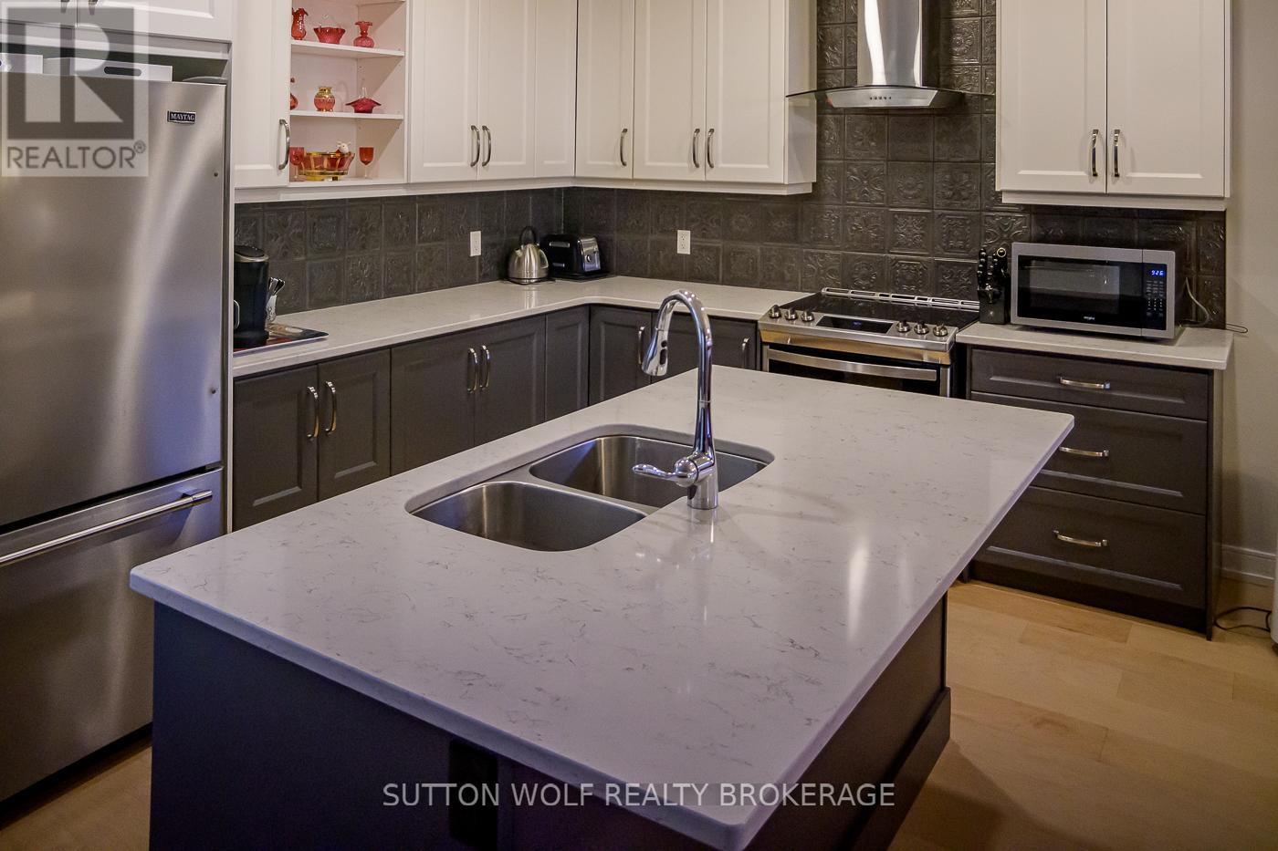 14 Elwood Street, Strathroy-Caradoc, Ontario N7G 0G5 - Photo 5 - X12465794