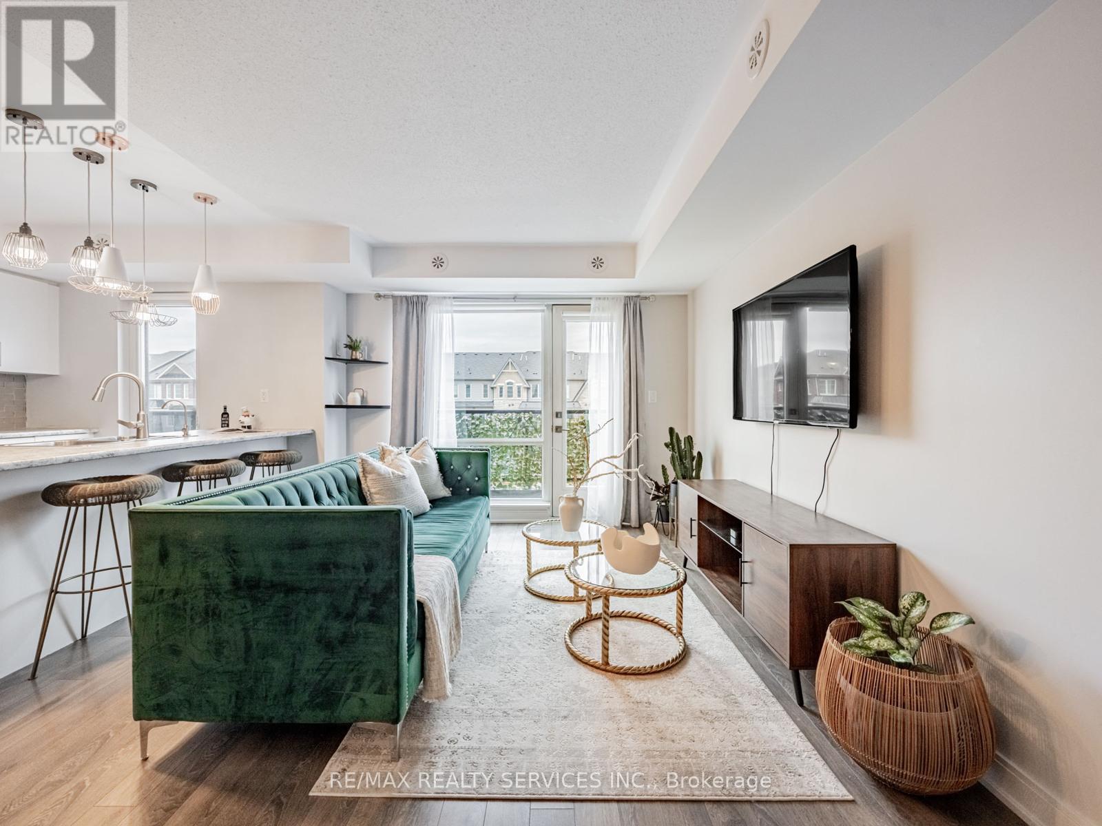 60 - 100 Dufay Road, Brampton, Ontario L7A 4S3 - Photo 3 - W12581406