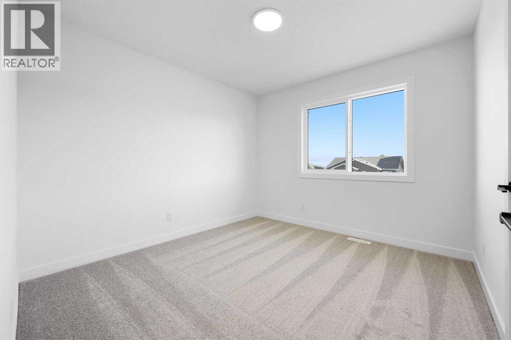 128 Mitchell Walk Nw, Calgary, Alberta  T3R 2G2 - Photo 14 - A2272479