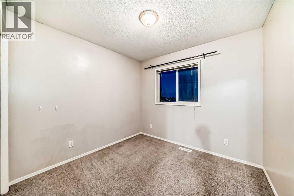 154 Bridlewood Drive Sw, Calgary, Alberta  T2Y 3T2 - Photo 38 - A2270530
