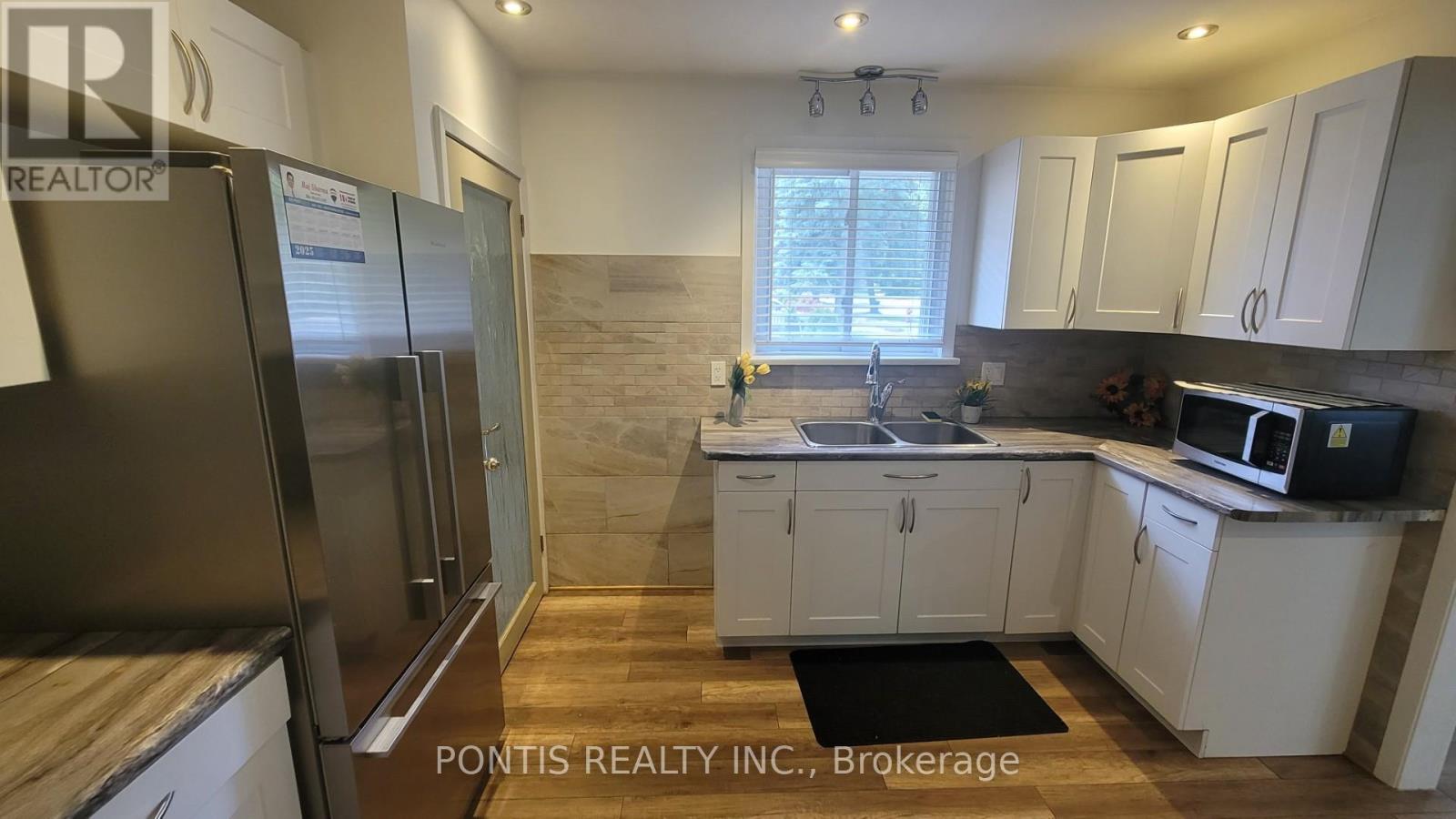 83 Denison Avenue, Brampton, Ontario  L6X 1E9 - Photo 5 - W12582636