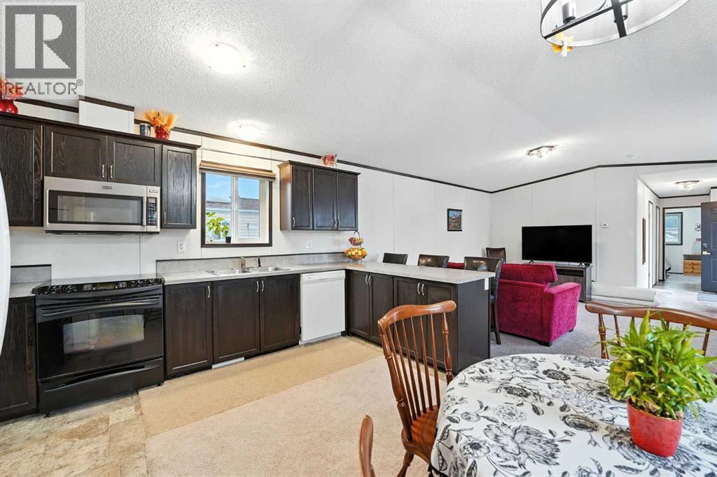 113 Heritage Drive, Okotoks, Alberta T1S 1M4 - Photo 10 - A2255552