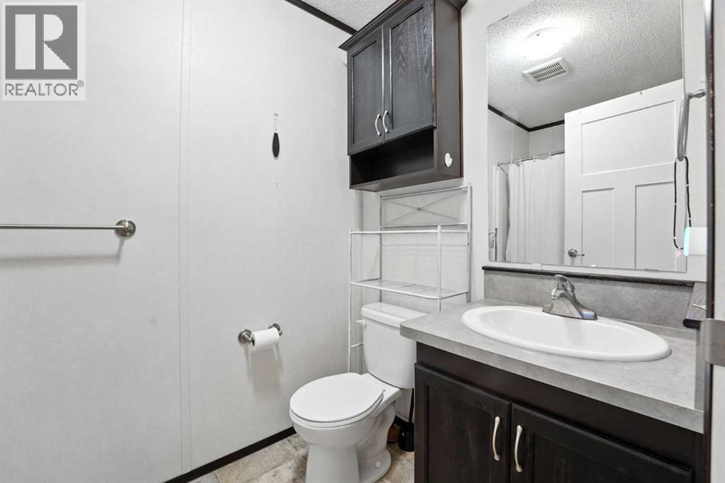 113 Heritage Drive, Okotoks, Alberta T1S 1M4 - Photo 6 - A2255552