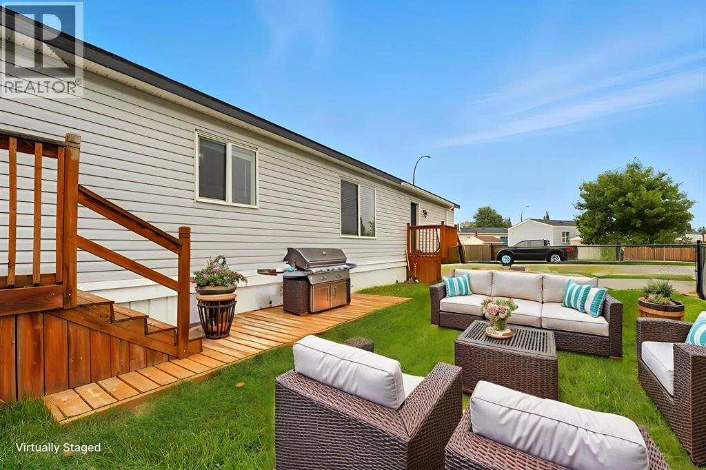 113 Heritage Drive, Okotoks, Alberta T1S 1M4 - Photo 1 - A2255552