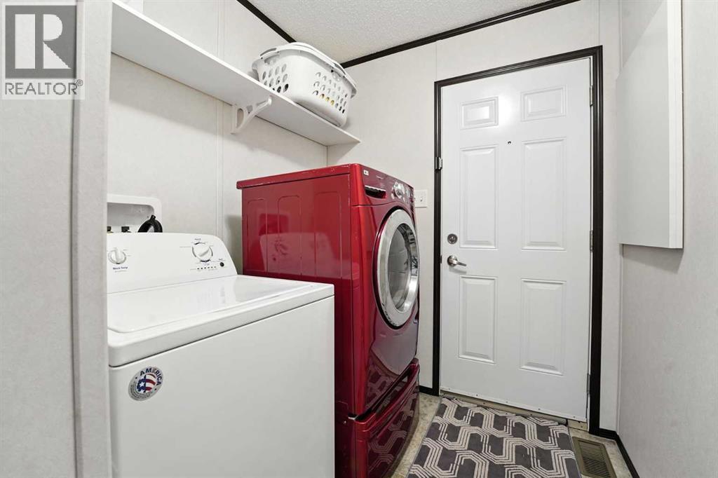 113 Heritage Drive, Okotoks, Alberta T1S 1M4 - Photo 4 - A2255552