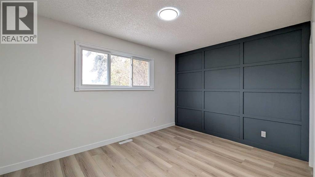 4 Harvey Place Sw, Calgary, Alberta  T2V 3A5 - Photo 14 - A2267449