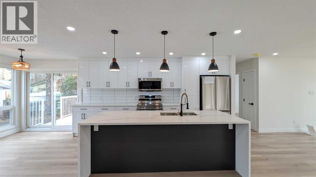 4 Harvey Place Sw, Calgary, Alberta  T2V 3A5 - Photo 7 - A2267449