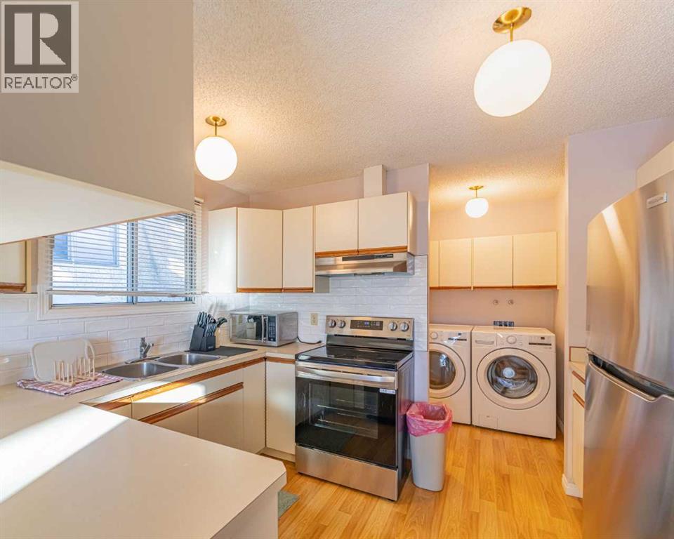 130 27 Avenue Nw, Calgary, Alberta  T2M 2H2 - Photo 5 - A2271591