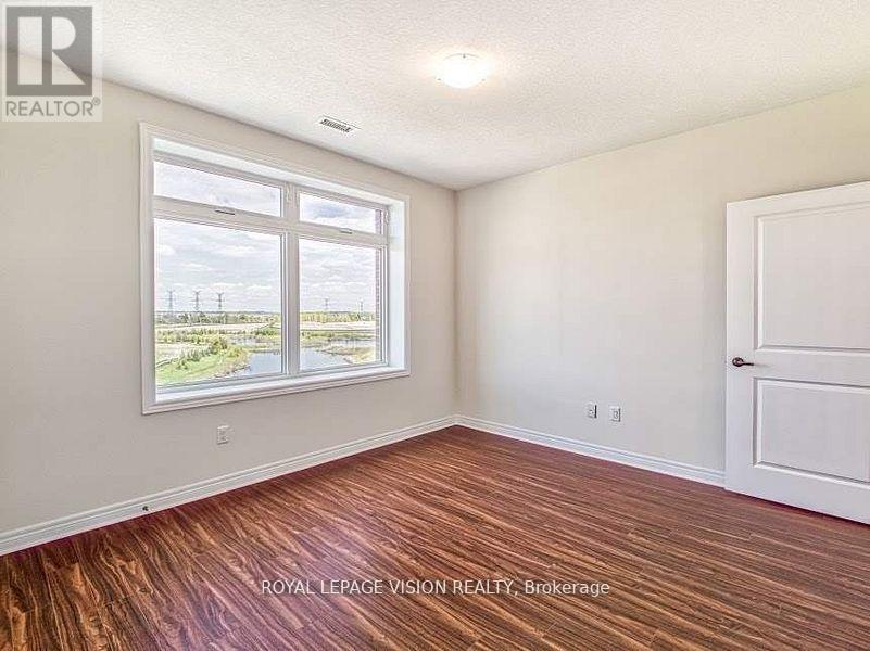 605 - 39 New Delhi Drive, Markham, Ontario  L3S 0E1 - Photo 5 - N12583310