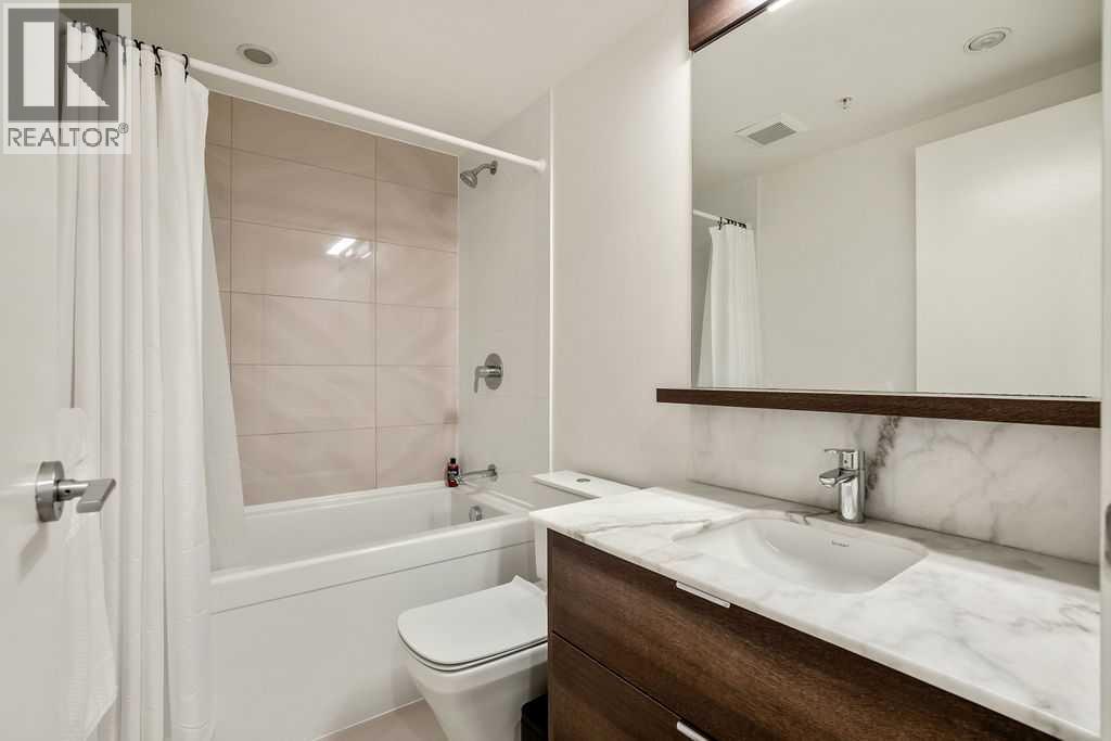 103, 108 Waterfront Court Sw, Calgary, Alberta  T2P 1K7 - Photo 9 - A2267231