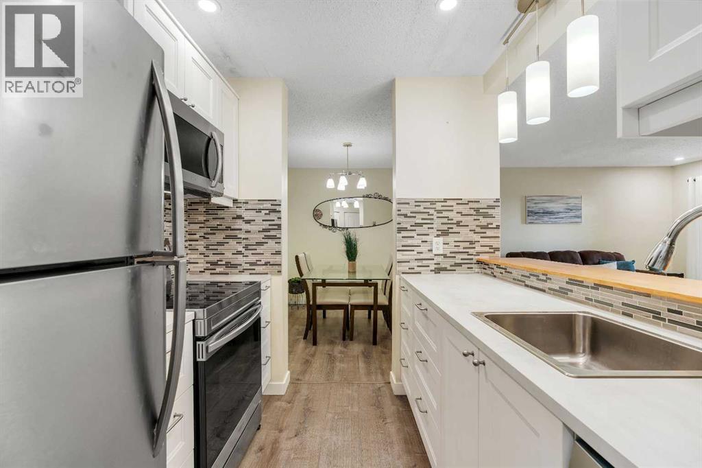 104, 11 Dover Point Se, Calgary, Alberta  T2B 3J8 - Photo 6 - A2259291