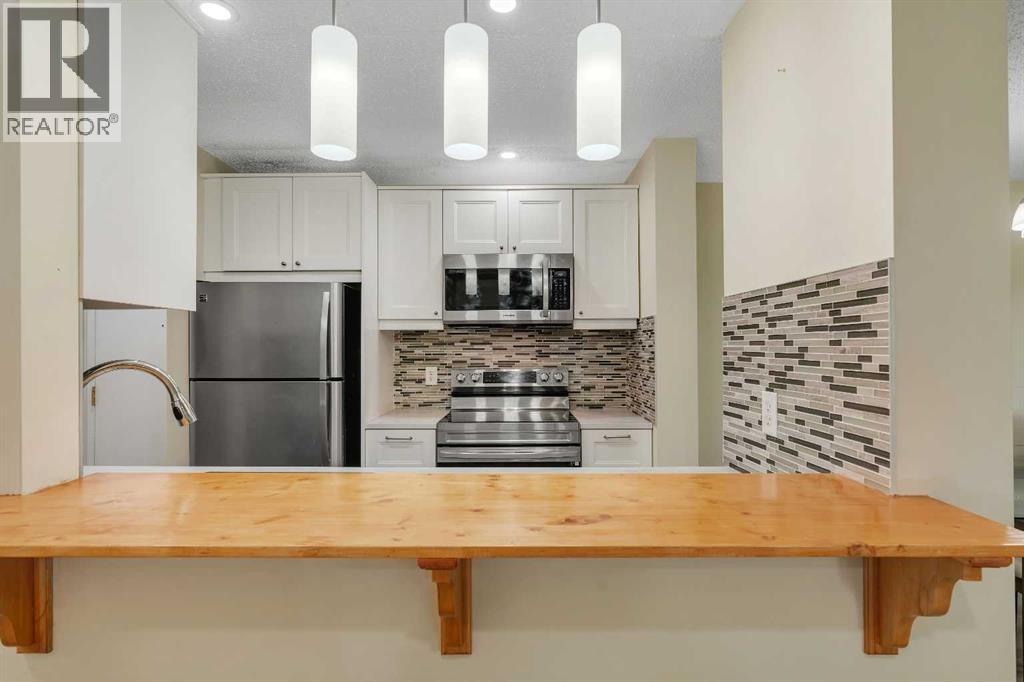 104, 11 Dover Point Se, Calgary, Alberta  T2B 3J8 - Photo 4 - A2259291