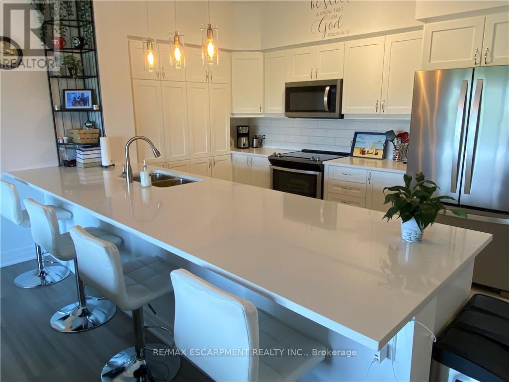 312 - 39 Sister Varga Terrace, Hamilton, Ontario  L9B 0J7 - Photo 6 - X12583490