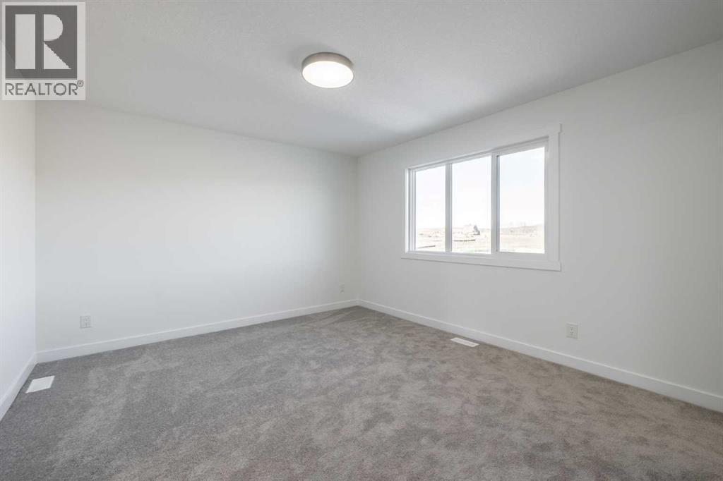 43 Heritage Manor, Cochrane, Alberta  T4C 0L3 - Photo 18 - A2265847
