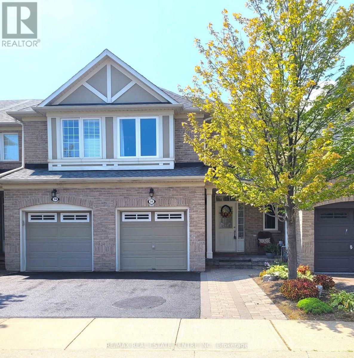 35 - 2295 Rochester Circle, Oakville, Ontario  L6M 5C8 - Photo 2 - W12583598