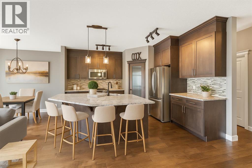 112 Kingsbridge Way, Airdrie, Alberta  T4B 0A9 - Photo 3 - A2267562